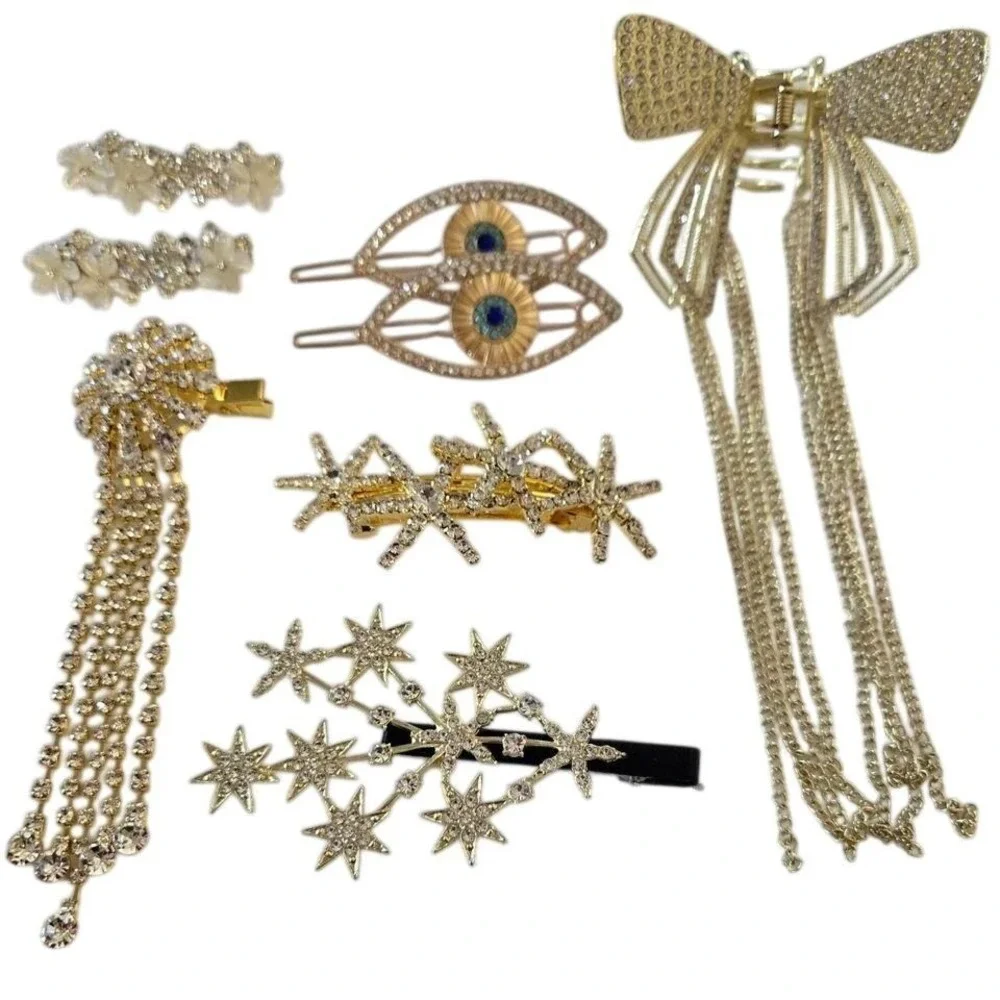 Lot of 8,‎ NEW Gold hair clips, claws and slides with rhinestones and tassels.